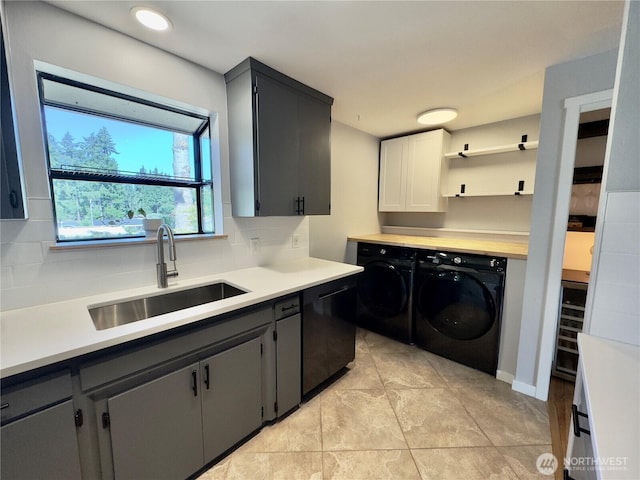 30135 2nd Ave SW, Federal Way, WA 98023 - laundry room featuring cabinet space, washer and clothes dryer, and light tile patterned floors