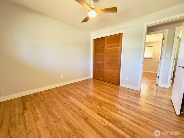 30135 2nd Ave SW, Federal Way, WA 98023 - unfurnished bedroom with light wood-style floors, a closet, and ceiling fan