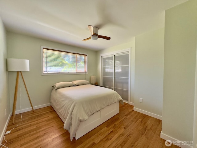 30135 2nd Ave SW, Federal Way, WA 98023 - bedroom with light wood-style floors, a closet, and a ceiling fan