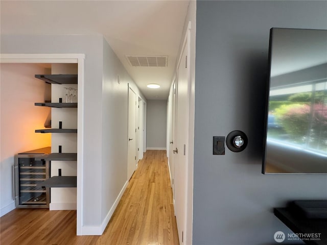 30135 2nd Ave SW, Federal Way, WA 98023 - hallway featuring light wood finished floors and wine cooler