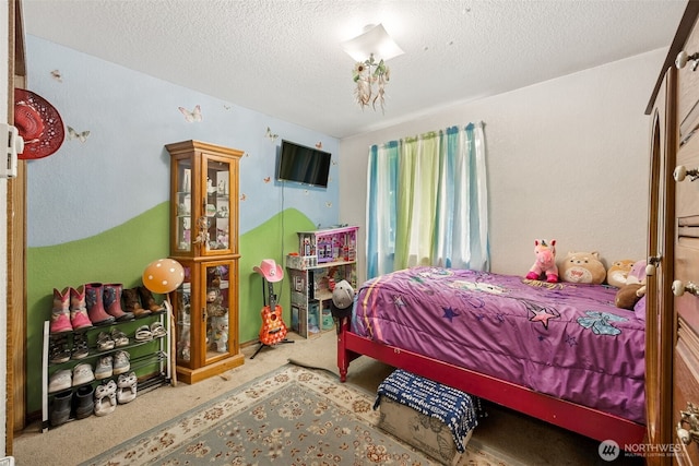 17112 Kinnikinnick Ct SE, Yelm, WA 98597 - bedroom with a textured ceiling and carpet