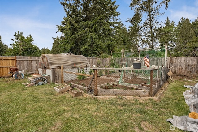17112 Kinnikinnick Ct SE, Yelm, WA 98597 - fenced backyard featuring a vegetable garden