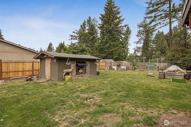 17112 Kinnikinnick Ct SE, Yelm, WA 98597 - fenced backyard with an outdoor structure