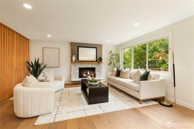 21 165th Ave SE, Bellevue, WA 98008 - living area with light wood finished floors, a fireplace, and recessed lighting