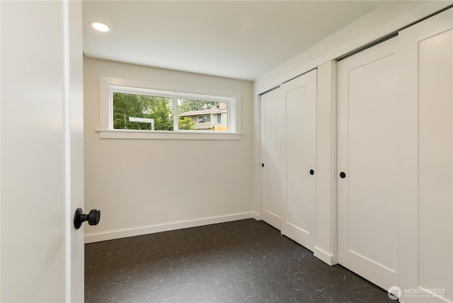 21 165th Ave SE, Bellevue, WA 98008 - unfurnished bedroom with baseboards and recessed lighting