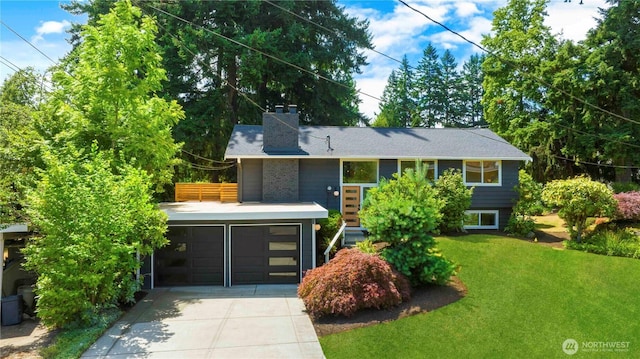 21 165th Ave SE, Bellevue, WA 98008 - view of front facade with a front yard, concrete driveway, and a chimney