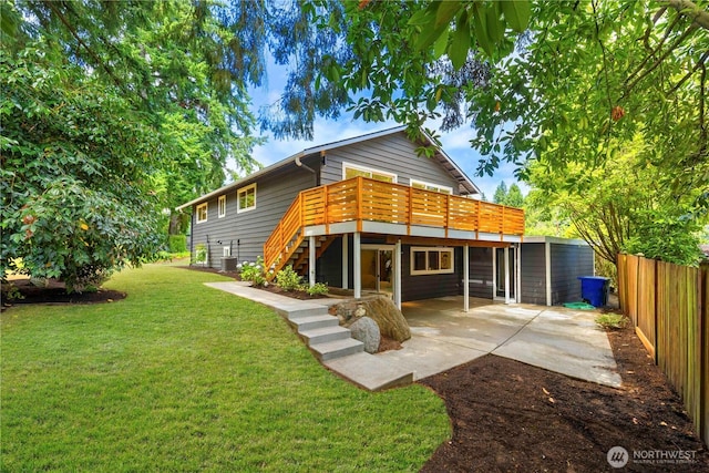 21 165th Ave SE, Bellevue, WA 98008 - rear view of property with stairs, a wooden deck, and a patio area