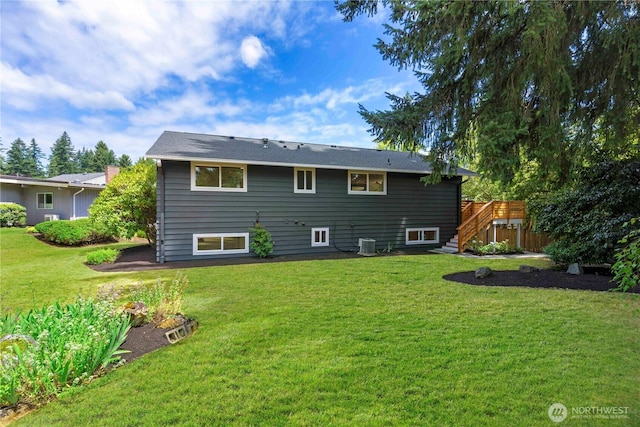 21 165th Ave SE, Bellevue, WA 98008 - back of property featuring stairs, a lawn, and a wooden deck