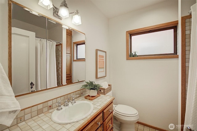2663 37th Ave SW, Seattle, WA 98126 - full bath with vanity, tile patterned floors, and curtained shower