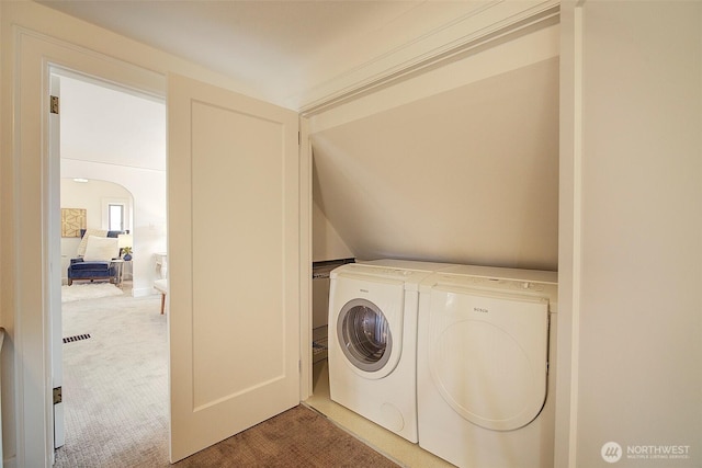 2663 37th Ave SW, Seattle, WA 98126 - laundry room featuring separate washer and dryer and carpet flooring