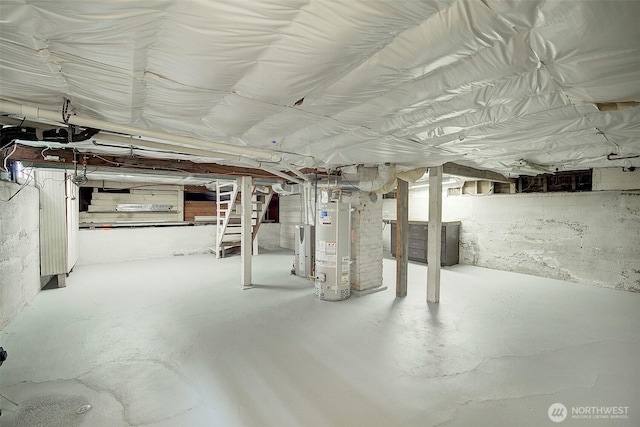 2663 37th Ave SW, Seattle, WA 98126 - unfinished below grade area featuring water heater and stairs
