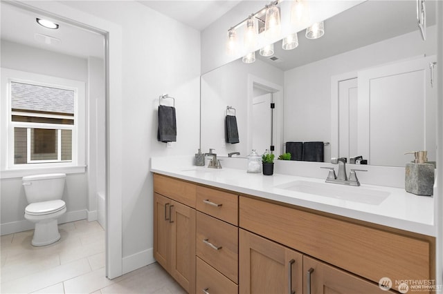 7164 91st St E, Puyallup, WA 98371 - bathroom with double vanity, tile patterned flooring, and a bath