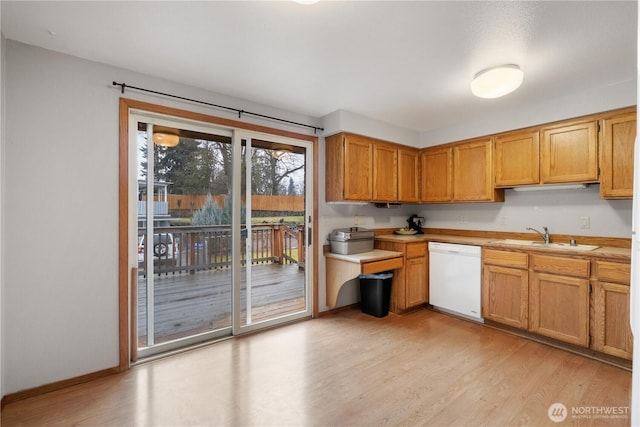 9724 N Wall St, Spokane, WA 99218 - kitchen featuring white dishwasher, light wood finished floors, and light countertops