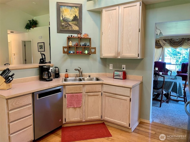 6214 145th St SE, Everett, WA 98208 - kitchen featuring stainless steel dishwasher, light wood-style flooring, light countertops, and light brown cabinetry