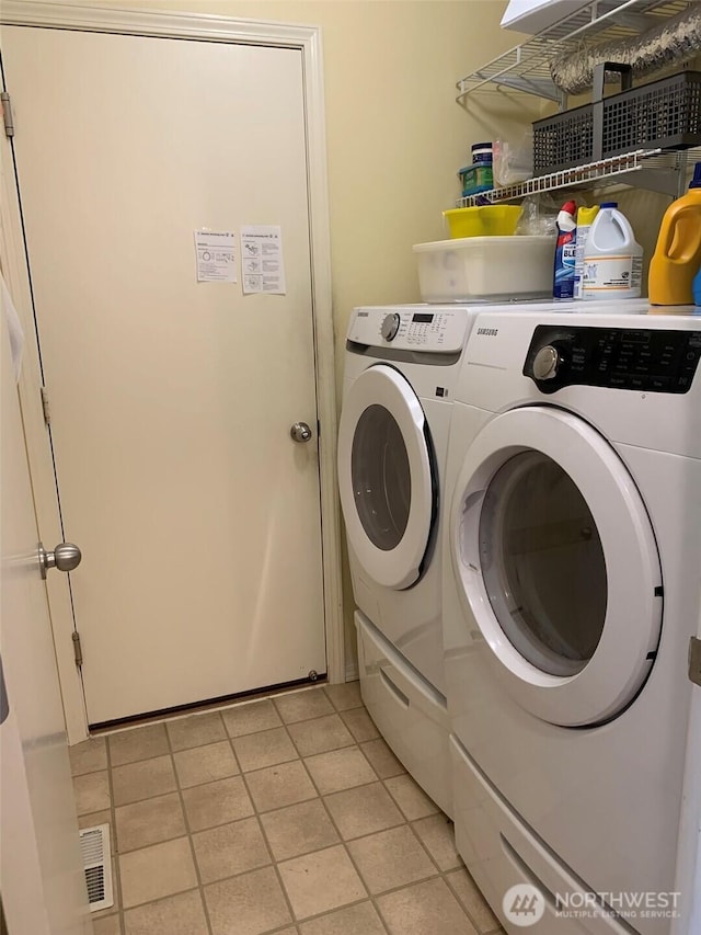 6214 145th St SE, Everett, WA 98208 - washroom with independent washer and dryer and light tile patterned flooring