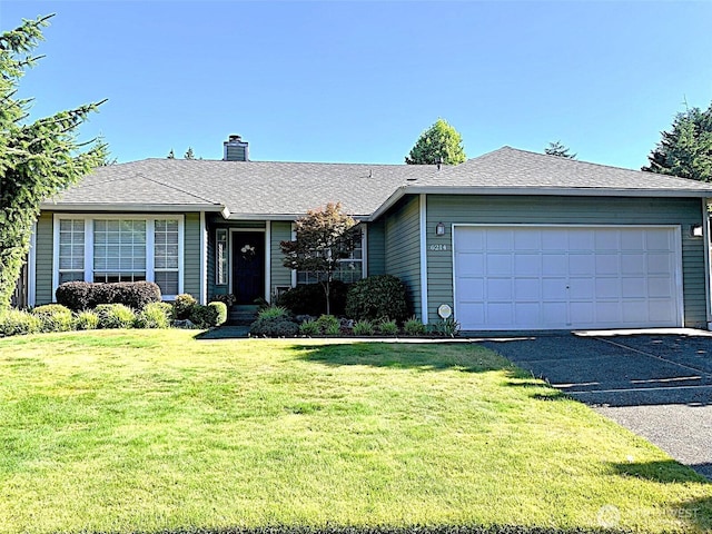 6214 145th St SE, Everett, WA 98208 - ranch-style house with a chimney, an attached garage, a front lawn, and driveway