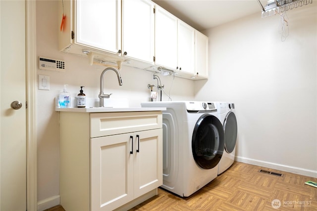 5265 140th Ave NE, Bellevue, WA 98005 - laundry area with cabinet space and washing machine and dryer