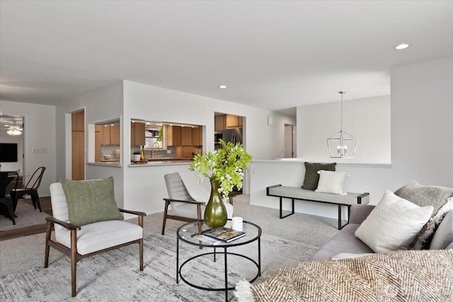 11404 SE 186th St, Renton, WA 98055 - living area featuring a chandelier, light carpet, and recessed lighting