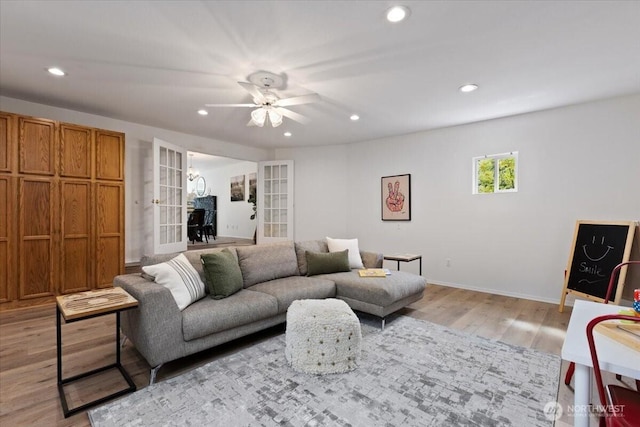 11404 SE 186th St, Renton, WA 98055 - living room featuring a ceiling fan, light wood-style flooring, recessed lighting, and french doors