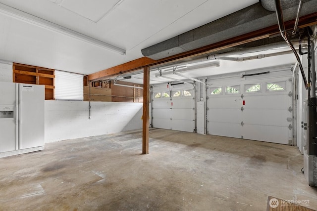 11404 SE 186th St, Renton, WA 98055 - garage featuring white fridge with ice dispenser