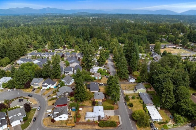11404 SE 186th St, Renton, WA 98055 - aerial view of property and surrounding area featuring a forest and nearby suburban area