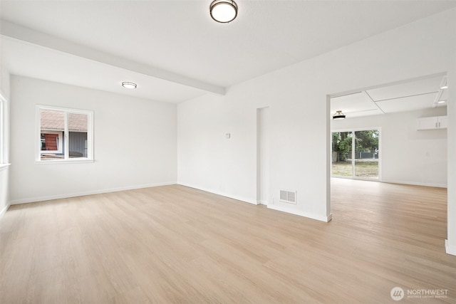910 E 60th St, Tacoma, WA 98404 - empty room featuring light wood-style flooring