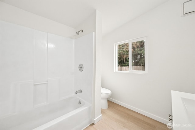 910 E 60th St, Tacoma, WA 98404 - bathroom with wood finished floors,  shower combination, and vanity
