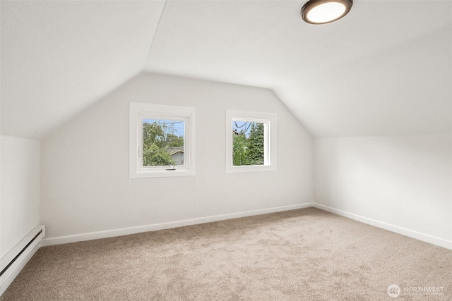 910 E 60th St, Tacoma, WA 98404 - additional living space featuring a baseboard heating unit, carpet, and lofted ceiling