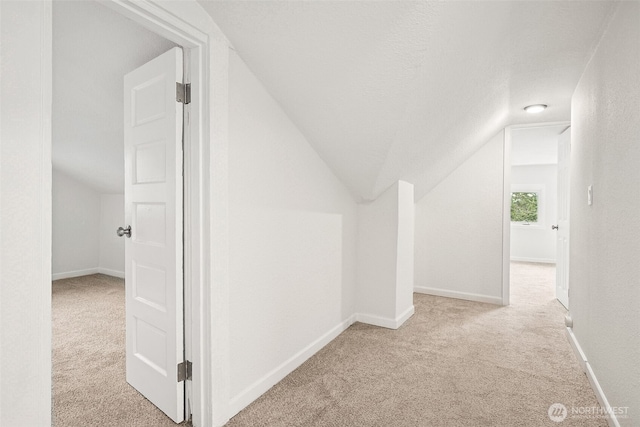 910 E 60th St, Tacoma, WA 98404 - additional living space with carpet floors and lofted ceiling
