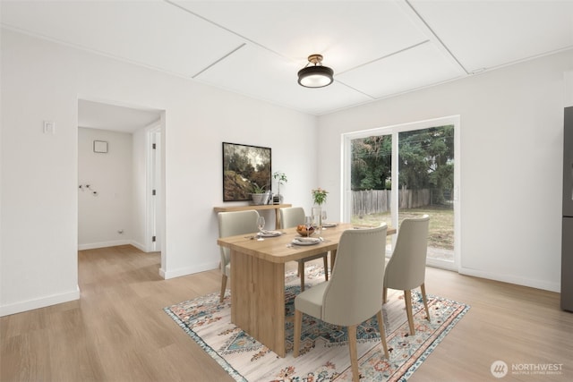 910 E 60th St, Tacoma, WA 98404 - dining space with light wood finished floors and attic access