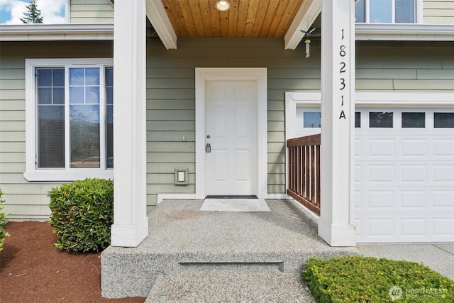 18231 2nd Pl W Unit A, Bothell, WA 98012 - entrance to property with a garage and a porch