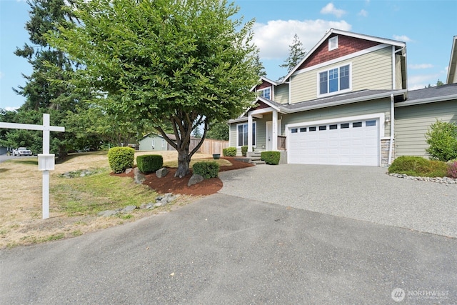 18231 2nd Pl W Unit A, Bothell, WA 98012 - view of front of property featuring asphalt driveway, an attached garage, a front yard, and a shingled roof