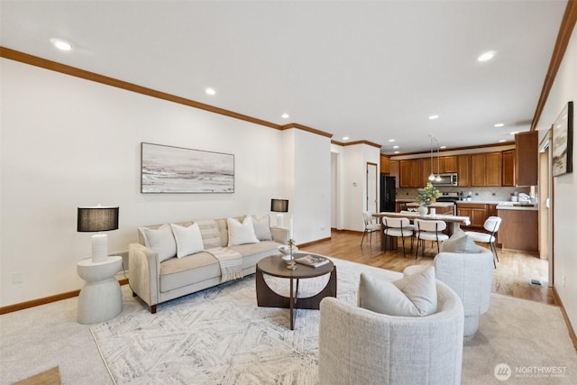 18231 2nd Pl W Unit A, Bothell, WA 98012 - living area featuring recessed lighting, ornamental molding, and light wood-style floors
