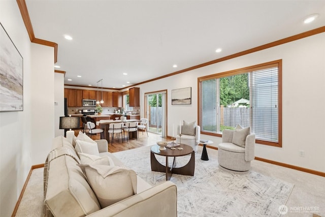 18231 2nd Pl W Unit A, Bothell, WA 98012 - living room with crown molding, healthy amount of natural light, and recessed lighting