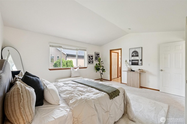 18231 2nd Pl W Unit A, Bothell, WA 98012 - bedroom featuring lofted ceiling and light carpet