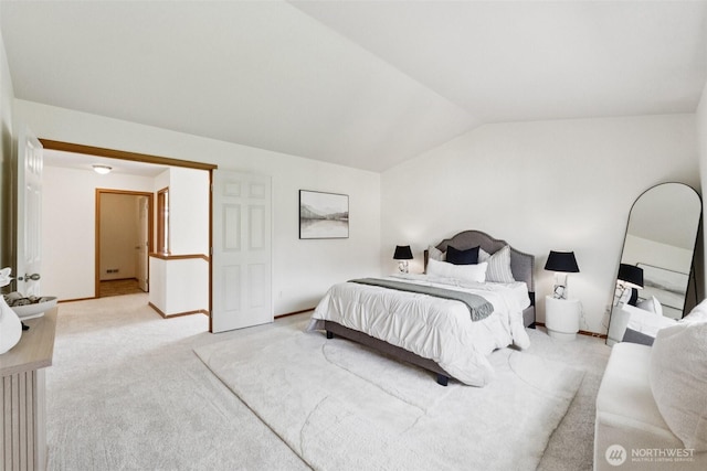 18231 2nd Pl W Unit A, Bothell, WA 98012 - bedroom with lofted ceiling and carpet