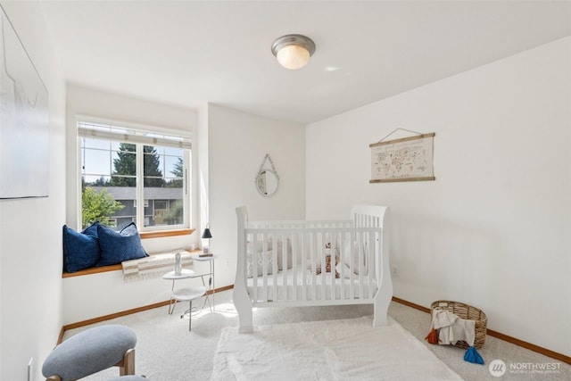 18231 2nd Pl W Unit A, Bothell, WA 98012 - carpeted bedroom featuring baseboards and a nursery area