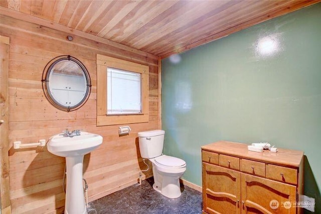 45401 Nellie Ln, Concrete, WA 98237 - half bathroom featuring wooden walls and wooden ceiling