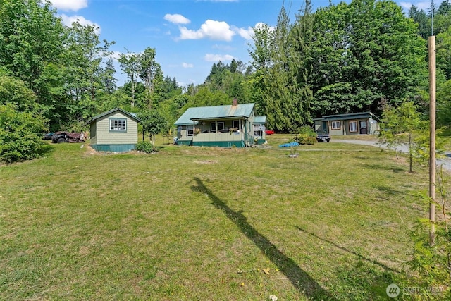 45401 Nellie Ln, Concrete, WA 98237 - view of green lawn with an outbuilding