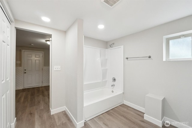 9442 S K St, Tacoma, WA 98444 - full bath featuring wood finished floors, bathing tub / shower combination, and recessed lighting