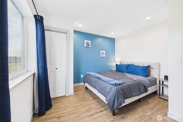 612 Dune Crest Loop, Westport, WA 98595 - bedroom with light wood finished floors, recessed lighting, and a closet