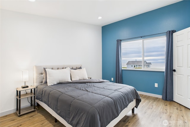 612 Dune Crest Loop, Westport, WA 98595 - bedroom with wood finished floors and recessed lighting