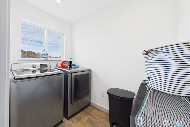 612 Dune Crest Loop, Westport, WA 98595 - laundry room with separate washer and dryer and light wood-style floors