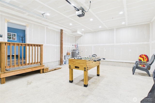 612 Dune Crest Loop, Westport, WA 98595 - playroom with concrete floors, a garage, and recessed lighting