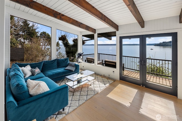 28605 Manzanita Beach Rd SW, Vashon, WA 98070 - sunroom with french doors, a water view, and beamed ceiling