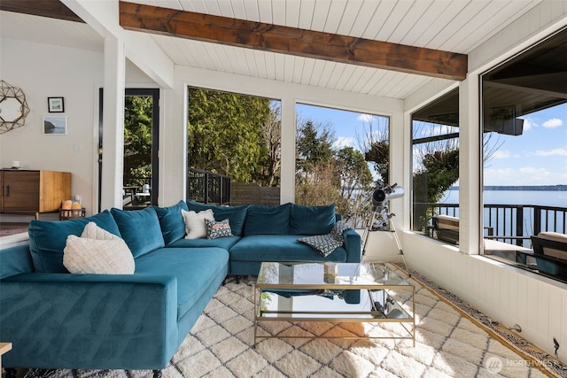 28605 Manzanita Beach Rd SW, Vashon, WA 98070 - sunroom / solarium featuring a water view, beamed ceiling, and healthy amount of natural light