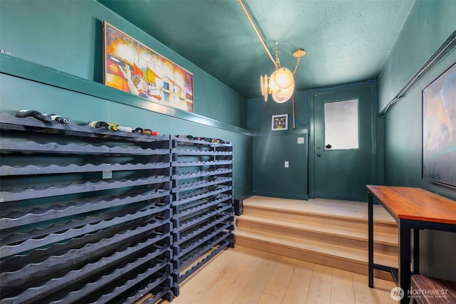 28605 Manzanita Beach Rd SW, Vashon, WA 98070 - wine area featuring hardwood / wood-style flooring