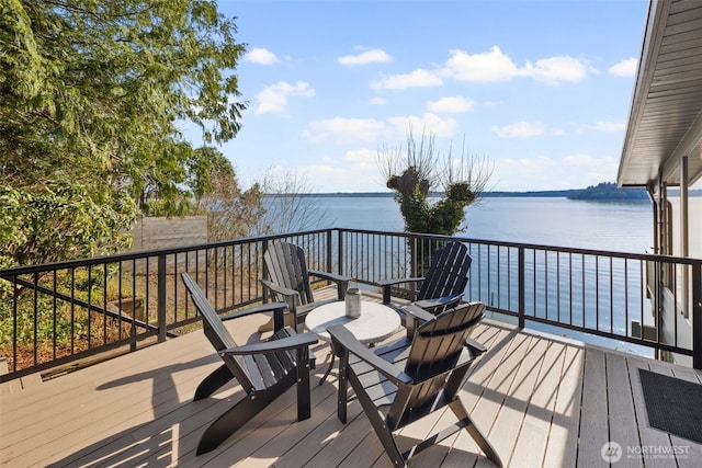 28605 Manzanita Beach Rd SW, Vashon, WA 98070 - wooden terrace with a water view