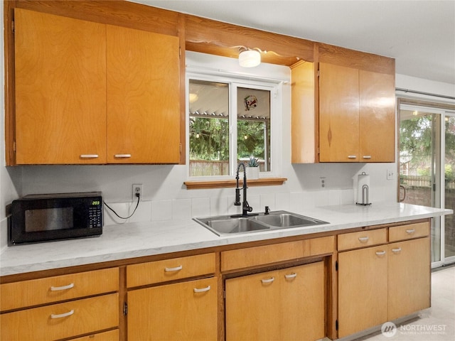 10818 108th St SW, Lakewood, WA 98498 - kitchen featuring black microwave and light countertops