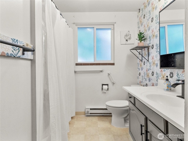 10818 108th St SW, Lakewood, WA 98498 - bathroom with baseboard heating, vanity, and curtained shower